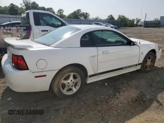 2003 Ford Mustang Standard z VIN 1FAFP40423F337129, wystawiony jako Copart lot #58982005 z przebiegiem 196 277 mil mil oraz Szkoda całkowita • Salvage title. Historia ofert i sprzedaży dostępna na DreamBid. Obrazek 3.