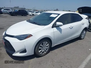 2018 Toyota Corolla L with VIN 5YFBURHE7JP810444, listed as a IAAI auction lot 42558647 with 74,794 mi miles and . Bid and sale history available at DreamBid. Image 18.