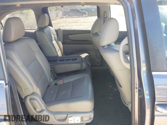 2015 Honda Odyssey EX-L with VIN 5FNRL5H61FB048170, listed as a IAAI auction lot 41822798 with 179,550 mi miles and . Bid and sale history available at DreamBid. Image 8.
