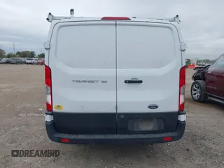 2020 Ford Transit Cargo with VIN 1FTYE1Y87LKA39598, listed as a IAAI auction lot 40989107 with 267,407 mi miles and . Bid and sale history available at DreamBid. Image 16.