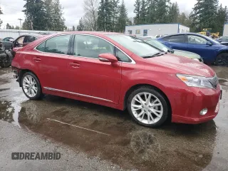 2010 Lexus HS 250h with VIN JTHBB1BA7A2015288, listed as a Copart auction lot 47601955 with 129,392 mi miles and Salvage Title. Bid and sale history available at DreamBid. Image 4.
