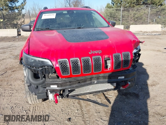 2019 Jeep Cherokee Trailhawk Elite with VIN 1C4PJMBX3KD217437, listed as a IAAI auction lot 41448614 with 85,889 mi miles. Bid and sale history available at carsss.com. Image 18.
