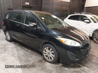 2014 Mazda 5 Sport with VIN JM1CW2BL5E0163023, listed as a IAAI auction lot 42517864 with 129,483 mi miles and . Bid and sale history available at DreamBid. Image 1.