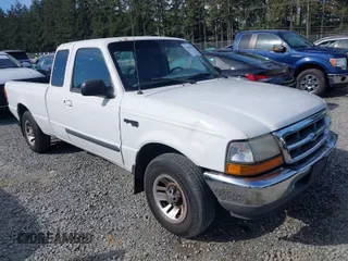 1999 Ford Ranger XLT with VIN 1FTYR14X0XPA65325, listed as a IAAI auction lot 42009611 with 218,657 mi miles. Bid and sale history available at carsss.com. Image 1.