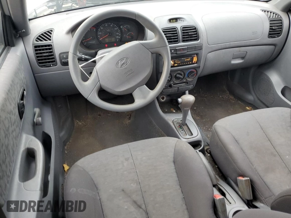 2005 Hyundai Accent GLS with VIN KMHCG45C45U631414, listed as a Copart auction lot 73963814 with 106,617 mi miles and Salvage Title. Bid and sale history available at carsss.com. Image 8.