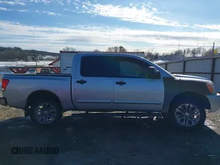 2011 Nissan Titan Pro-4X with VIN 1N6BA0EC8BN304544, listed as a IAAI auction lot 41329674 with 235,319 mi miles and . Bid and sale history available at DreamBid. Image 14.