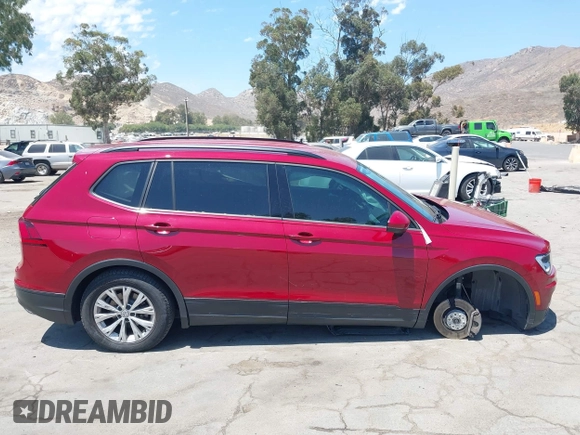 2018 Volkswagen Tiguan S with VIN 3VV1B7AX4JM043324, listed as a IAAI auction lot 42623550 with 62,858 mi miles and . Bid and sale history available at DreamBid. Image 13.