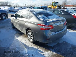 2015 Nissan Sentra S with VIN 3N1AB7APXFY285732, listed as a IAAI auction lot 41591212 with 137,721 mi miles. Bid and sale history available at carsss.com. Image 3.