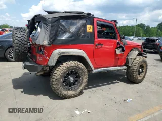 2014 Jeep Wrangler Sport with VIN 1C4AJWAG4EL205584, listed as a Copart auction lot 63671245 with Not provided miles and Salvage title. Bid and sale history available at DreamBid. Image 3.