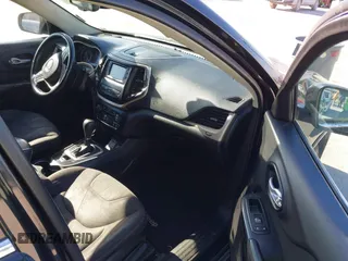 2016 Jeep Cherokee Latitude with VIN 1C4PJLCB8GW330017, listed as a IAAI auction lot 41444346 with 354,212 mi miles. Bid and sale history available at carsss.com. Image 5.