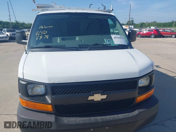 2014 Chevrolet Express Cargo with VIN 1GCWGFCA5E1121007, listed as a IAAI auction lot 42505878 with 178,916 mi miles and . Bid and sale history available at DreamBid. Image 6.