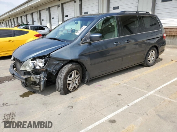 2006 Honda Odyssey EX with VIN 5FNRL38416B446272, listed as a Copart auction lot 57165545 with 219,042 mi miles and Salvage title. Bid and sale history available at DreamBid. Image 1.