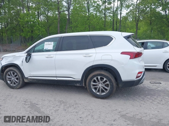 2019 Hyundai Santa Fe SE with VIN 5NMS2CAD9KH117777, listed as a IAAI auction lot 42296811 with 82,188 mi miles and . Bid and sale history available at DreamBid. Image 14.