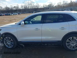 2016 Lincoln MKX Reserve with VIN 2LMTJ8LR4GBL44989, listed as a IAAI auction lot 41684823 with 101,528 mi miles. Bid and sale history available at carsss.com. Image 14.