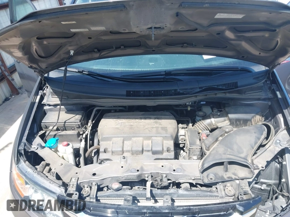2014 Honda Odyssey Touring with VIN 5FNRL5H99EB075979, listed as a IAAI auction lot 42520154 with 99,314 mi miles and . Bid and sale history available at DreamBid. Image 10.