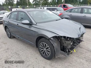 2019 Volkswagen Jetta S z VIN 3VWC57BU5KM223056, wystawiony jako IAAI lot #42696119 z przebiegiem 56 586 mil mil oraz . Historia ofert i sprzedaży dostępna na DreamBid. Obrazek 1.