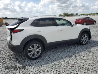 2021 Mazda CX-30 Premium z VIN 3MVDMADM5MM228747, wystawiony jako Copart lot #51747475 z przebiegiem 13 562 mil mil oraz Nie do naprawy • Non repairable. Historia ofert i sprzedaży dostępna na DreamBid. Obrazek 3.