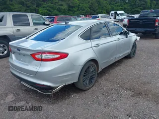 2014 Ford Fusion SE with VIN 3FA6P0H93ER299697, listed as a IAAI auction lot 42139387 with Not Provided miles and . Bid and sale history available at carsss.com. Image 4.