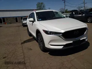 2018 Mazda CX-5 Touring with VIN JM3KFBCMXJ0389773, listed as a Copart auction lot 54737795 with 82,103 mi miles and Salvage Title. Bid and sale history available at DreamBid. Image 13.