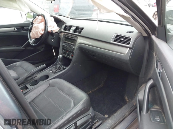 2014 Volkswagen Passat Wolfsburg Edition with VIN 1VWAT7A37EC102282, listed as a IAAI auction lot 42310561 with 113,374 mi miles and . Bid and sale history available at DreamBid. Image 5.