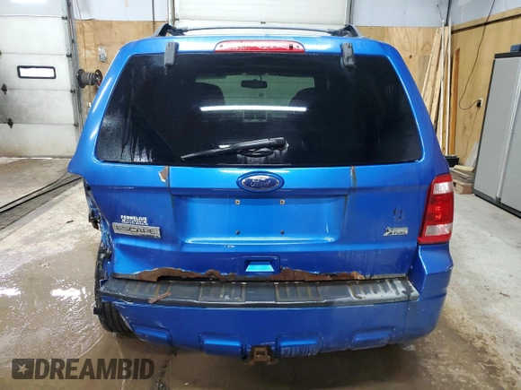 2012 Ford Escape XLT z VIN 1FMCU9DG3CKB40111, wystawiony jako Copart lot #52329085 z przebiegiem 106 114 mil mil oraz Czysty tytuł • Clean title. Historia ofert i sprzedaży dostępna na DreamBid. Obrazek 6.
