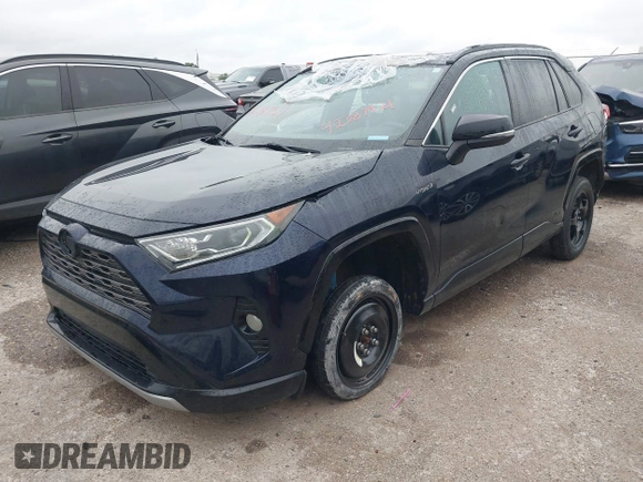 2021 Toyota RAV4 Hybrid XSE with VIN 2T3E6RFV5MW002856, listed as a IAAI auction lot 42387921 with Not provided miles and . Bid and sale history available at DreamBid. Image 18.