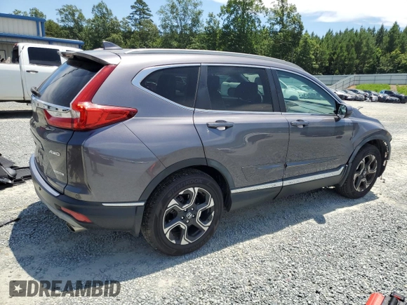 2018 Honda CR-V Touring with VIN 7FARW2H99JE013003, listed as a Copart auction lot 63364805 with 40,051 mi miles and Salvage title. Bid and sale history available at DreamBid. Image 3.