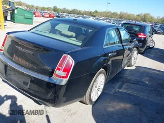 2012 Chrysler 300 C Luxury Series with VIN 2C3CCAPT4CH289639, listed as a IAAI auction lot 40634352 with 118,958 mi miles and . Bid and sale history available at carsss.com. Image 4.
