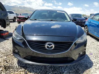 2014 Mazda 6 i Grand Touring с VIN JM1GJ1W61E1146244, выставлен на аукционе Copart как лот 57856365 с пробегом 152 194 миль миль и Списание • Salvage title. История ставок и продаж доступна на DreamBid. Изображение 5.