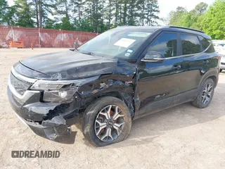 2021 Kia Seltos EX with VIN KNDERCAAXM7228380, listed as a IAAI auction lot 42015912 with 61,612 mi miles. Bid and sale history available at carsss.com. Image 18.