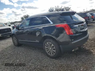 2017 Cadillac XT5 Premium Luxury FWD z VIN 1GYKNCRS7HZ130553, wystawiony jako Copart lot #60337905 z przebiegiem Nie podano mil oraz Szkoda całkowita • Salvage title. Historia ofert i sprzedaży dostępna na DreamBid. Obrazek 2.