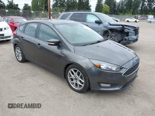 2015 Ford Focus SE with VIN 1FADP3K26FL269811, listed as a IAAI auction lot 42148333 with 157,192 mi miles. Bid and sale history available at carsss.com. Image 1.