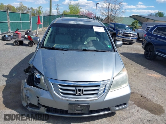 2010 Honda Odyssey EX-L with VIN 5FNRL3H74AB046578, listed as a IAAI auction lot 42049213 with 218,457 mi miles. Bid and sale history available at carsss.com. Image 12.