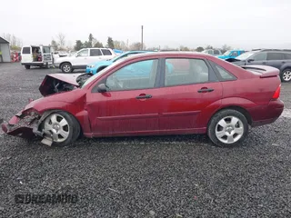2007 Ford Focus S with VIN 1FAHP34N57W187755, listed as a IAAI auction lot 41839701 with Not Provided miles and . Bid and sale history available at carsss.com. Image 14.