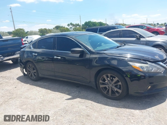 2018 Nissan Altima SV with VIN 1N4AL3AP8JC259494, listed as a IAAI auction lot 42041433 with 150,970 mi miles and . Bid and sale history available at DreamBid. Image 14.