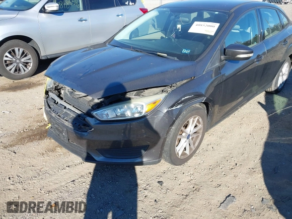 2015 Ford Focus SE with VIN 1FADP3F26FL280298, listed as a IAAI auction lot 40852000 with 144,805 mi miles and . Bid and sale history available at DreamBid. Image 6.