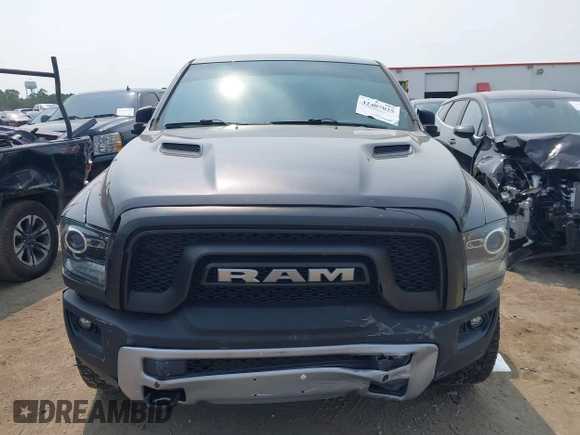 2017 Ram 1500 Rebel with VIN 1C6RR7YT6HS861839, listed as a IAAI auction lot 42407025 with 127,084 mi miles and . Bid and sale history available at DreamBid. Image 12.