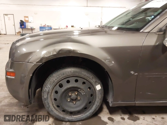 2010 Chrysler 300 Touring with VIN 2C3CA5CV9AH213299, listed as a IAAI auction lot 41754215 with 172,467 mi miles. Bid and sale history available at carsss.com. Image 6.