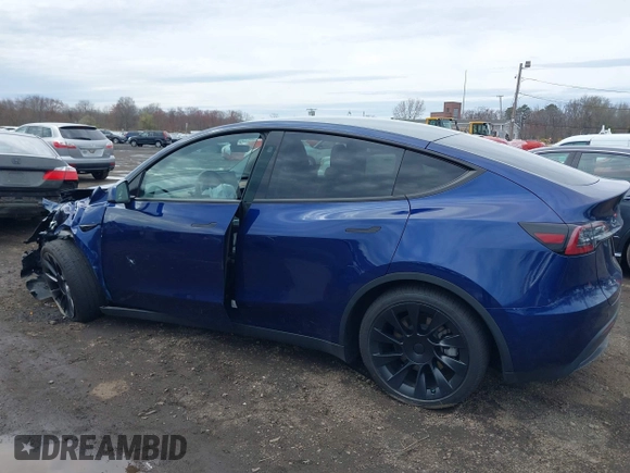 2023 Tesla Model Y Long Range with VIN 7SAYGDEE4PF891709, listed as a IAAI auction lot 41944893 with 15,864 mi miles. Bid and sale history available at carsss.com. Image 21.