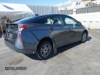 2017 Toyota Prius Two with VIN JTDKARFU4H3036689, listed as a IAAI auction lot 42265196 with 110,310 mi miles and . Bid and sale history available at DreamBid. Image 4.