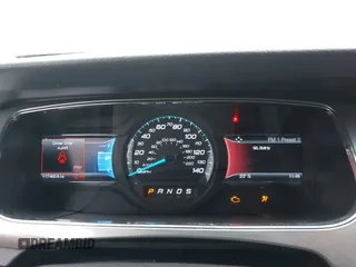 2014 Ford Taurus SEL z VIN 1FAHP2E85EG121636, wystawiony jako IAAI lot #41036886 z przebiegiem 117 460 mil mil oraz . Historia ofert i sprzedaży dostępna na DreamBid. Obrazek 7.