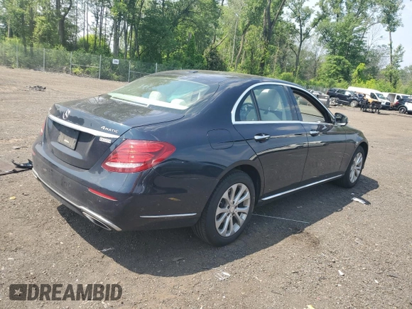 2017 Mercedes-Benz E 300 Luxury with VIN WDDZF4KBXHA185598, listed as a Copart auction lot 61011935 with 59,116 mi miles and Salvage title. Bid and sale history available at DreamBid. Image 3.