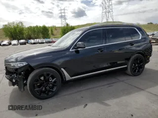 2022 BMW X7 xDrive40i z VIN 5UXCW2C01N9J33094, wystawiony jako Copart lot #57254975 z przebiegiem 26 145 mil mil oraz Szkoda całkowita • Salvage title. Historia ofert i sprzedaży dostępna na DreamBid. Obrazek 1.