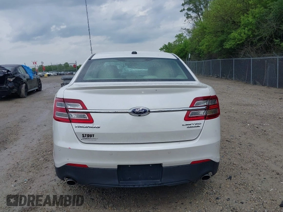 2014 Ford Taurus Limited with VIN 1FAHP2F82EG121267, listed as a IAAI auction lot 42377620 with 123,199 mi miles and . Bid and sale history available at DreamBid. Image 17.
