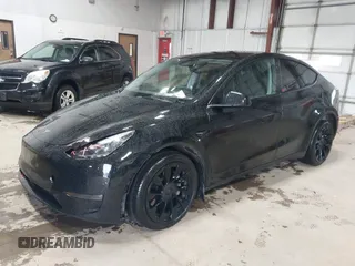 2023 Tesla Model Y Long Range with VIN 7SAYGDEE2PF808844, listed as a IAAI auction lot 41941905 with 39,951 mi miles and . Bid and sale history available at carsss.com. Image 2.