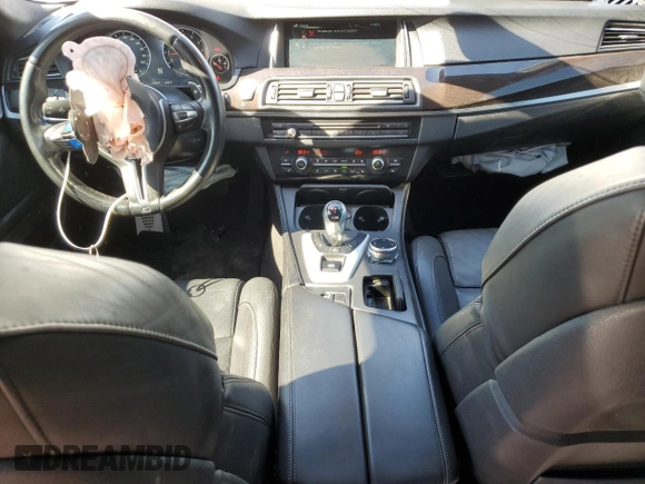 2014 BMW M5 with VIN WBSFV9C57ED097570, listed as a Copart auction lot 88571785 with 100,391 mi miles and Salvage Title. Bid and sale history available at carsss.com. Image 8.