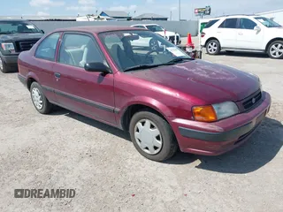 1996 Toyota Tercel DX z VIN JT2AC52L9T0117962, wystawiony jako IAAI lot #41785420 z przebiegiem 143 274 mil mil oraz . Historia ofert i sprzedaży dostępna na DreamBid. Obrazek 1.