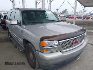 2005 GMC Yukon SLT z VIN 1GKEC13V65J250116, wystawiony jako IAAI lot #42497157 z przebiegiem 196 813 mil mil oraz . Historia ofert i sprzedaży dostępna na DreamBid. Obrazek 1.
