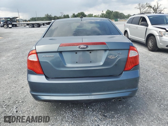 2012 Ford Fusion SE z VIN 3FAHP0HA1CR372744, wystawiony jako Copart lot #59118315 z przebiegiem Nie podano mil oraz Szkoda całkowita • Salvage title. Historia ofert i sprzedaży dostępna na DreamBid. Obrazek 6.