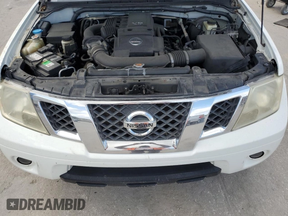 2015 Nissan Frontier SV z VIN 1N6AD0FR9FN754344, wystawiony jako Copart lot #80561574 z przebiegiem 131 225 mil mil oraz Szkoda całkowita • Salvage title. Historia ofert i sprzedaży dostępna na DreamBid. Obrazek 11.